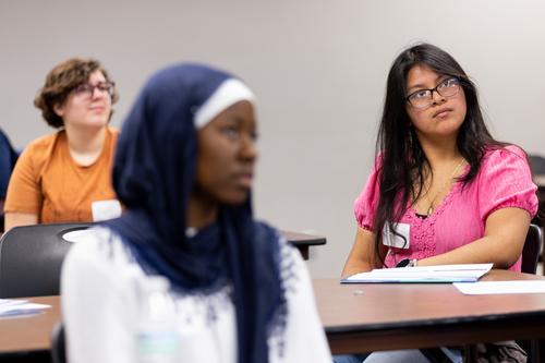 Students attend an academic symposium